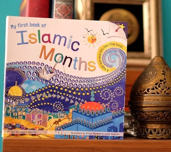 Islamic Months book displayed on a wooden shelf