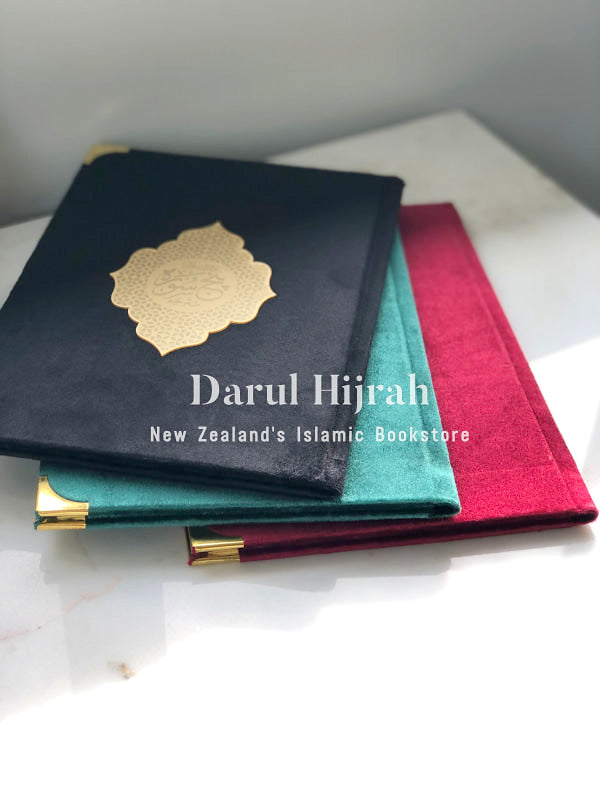 Panj Surah — black velvet edition on green and maroon books