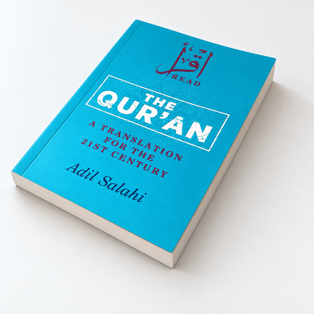 The Qur’an, a translation for the 21st century by Adil Salahi, turquoise cover on a light background